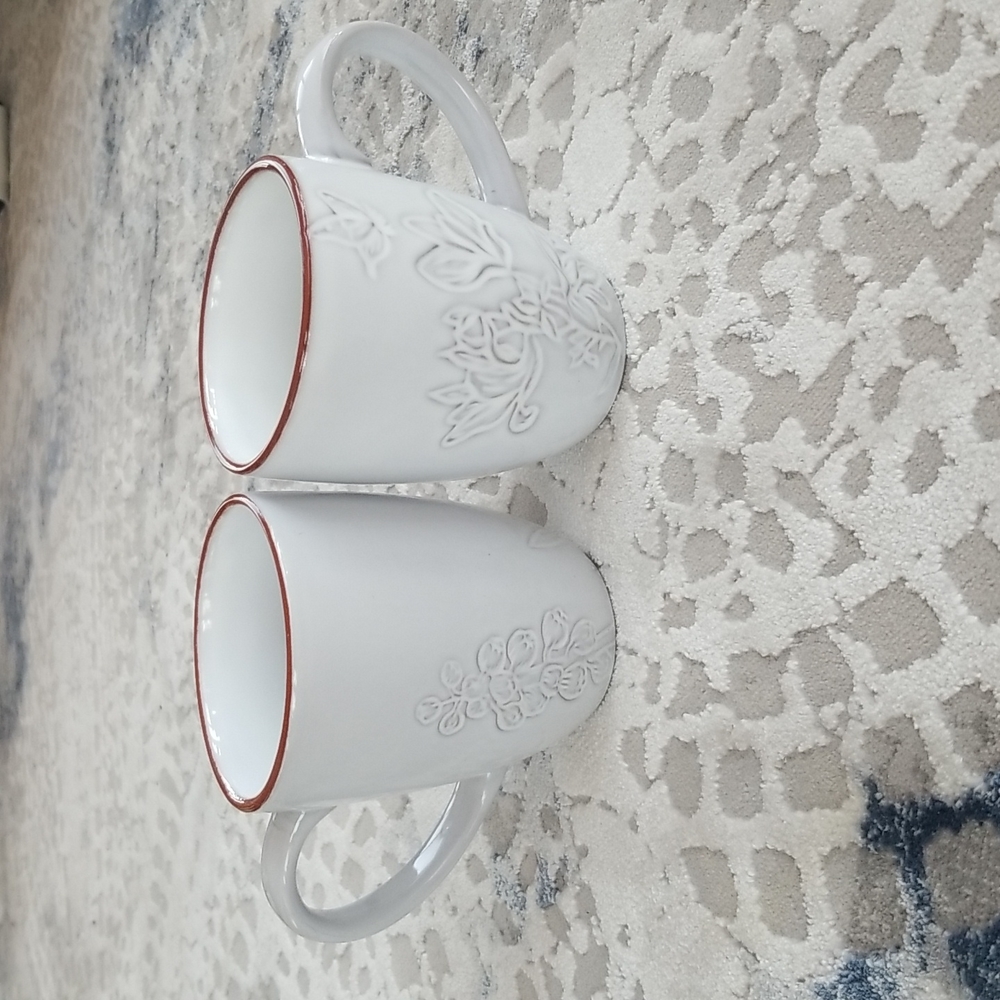 2 Pier 1 coffee \ tea mugs White with embossed design